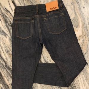 Railcar low rise raw denim jeans.